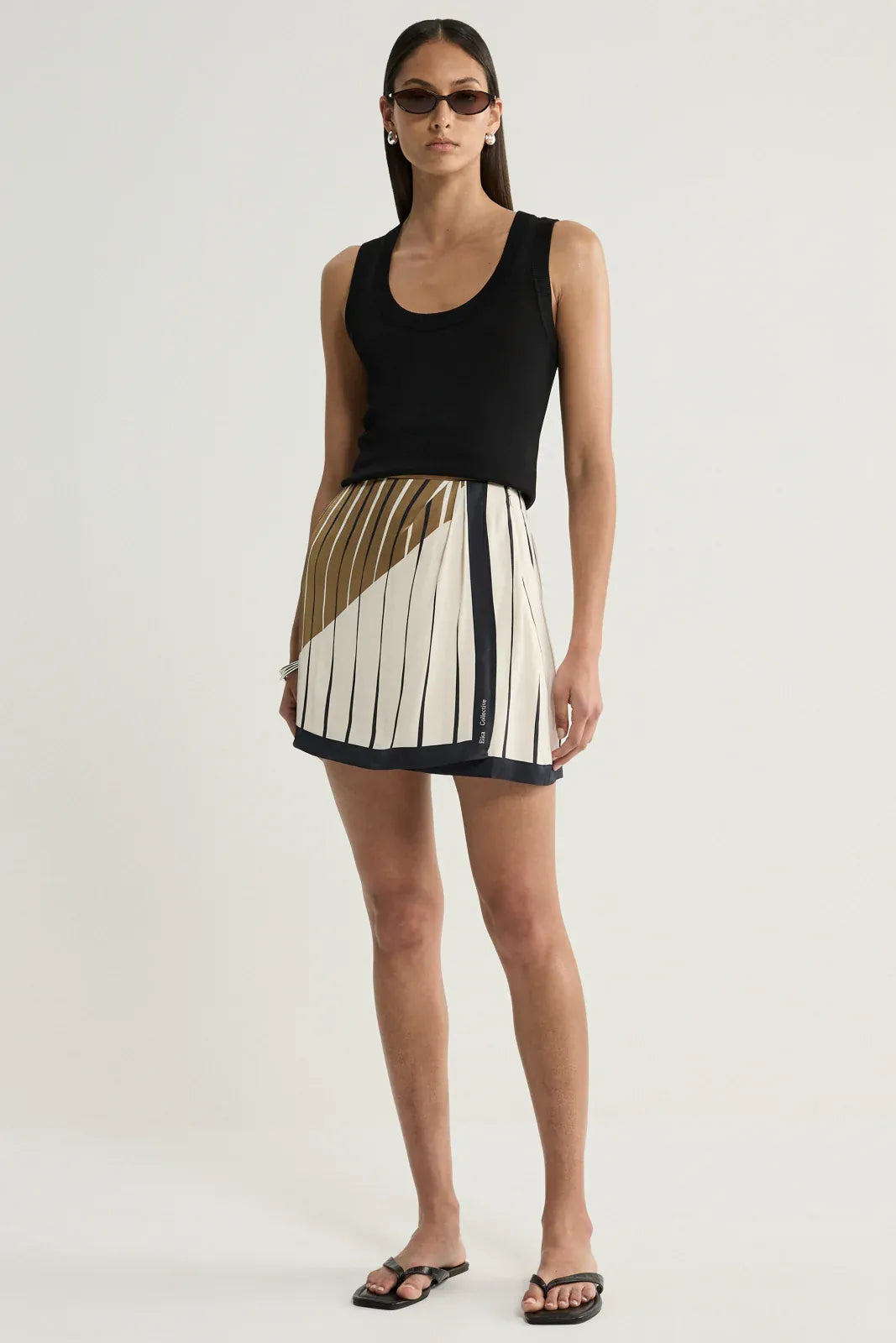 Elka Collective Skirts Sloane Mini Skirt - Moss Stripe