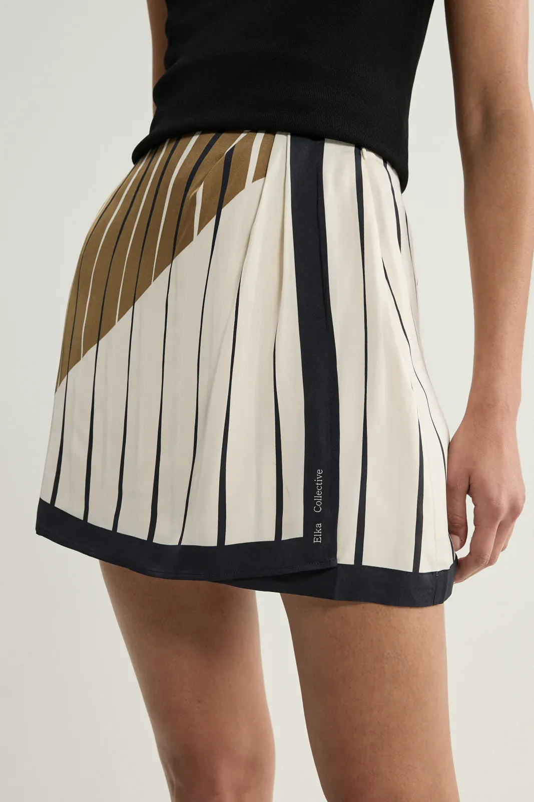 Elka Collective Skirts Sloane Mini Skirt - Moss Stripe